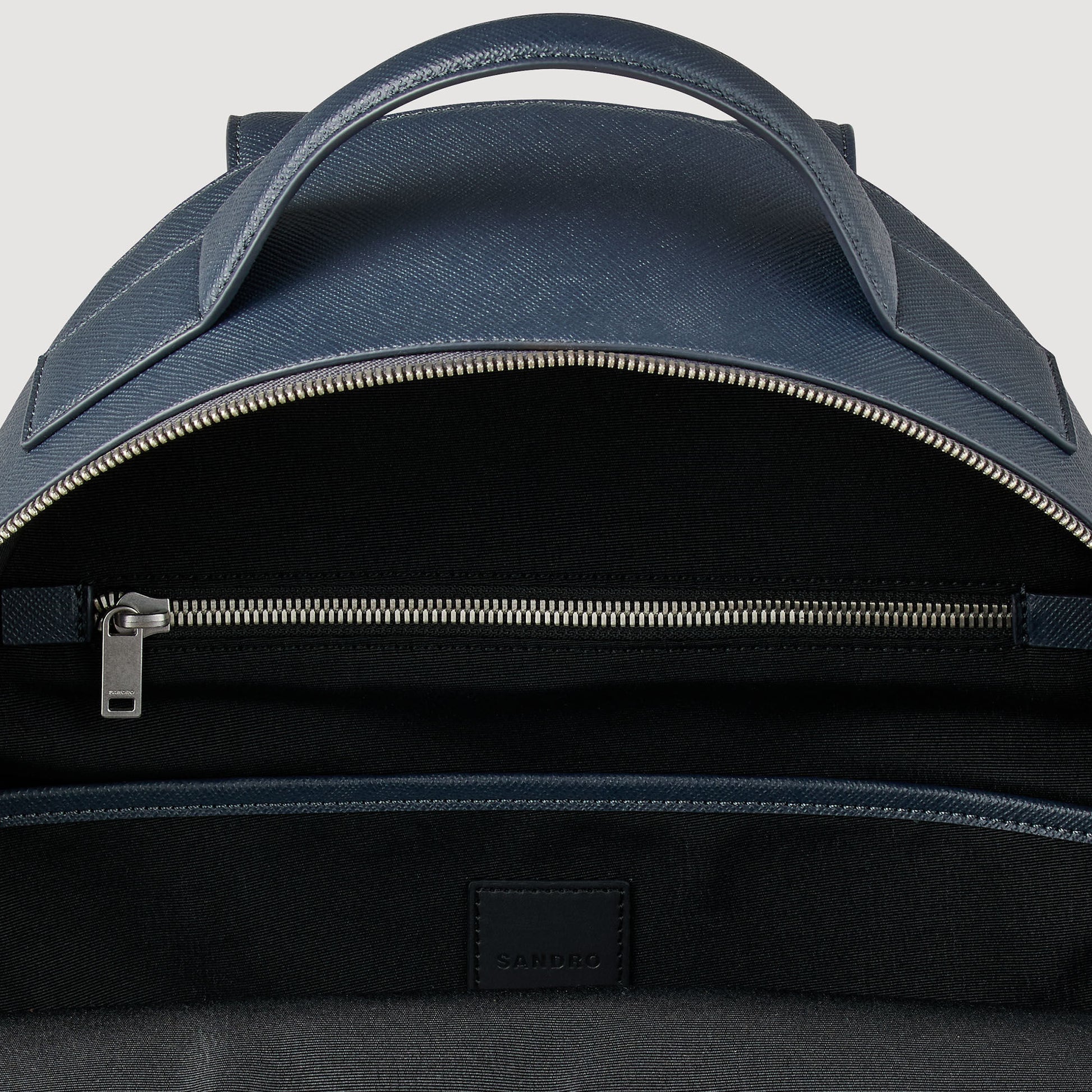 Sandro Reconstituted leather rucksack Fonte