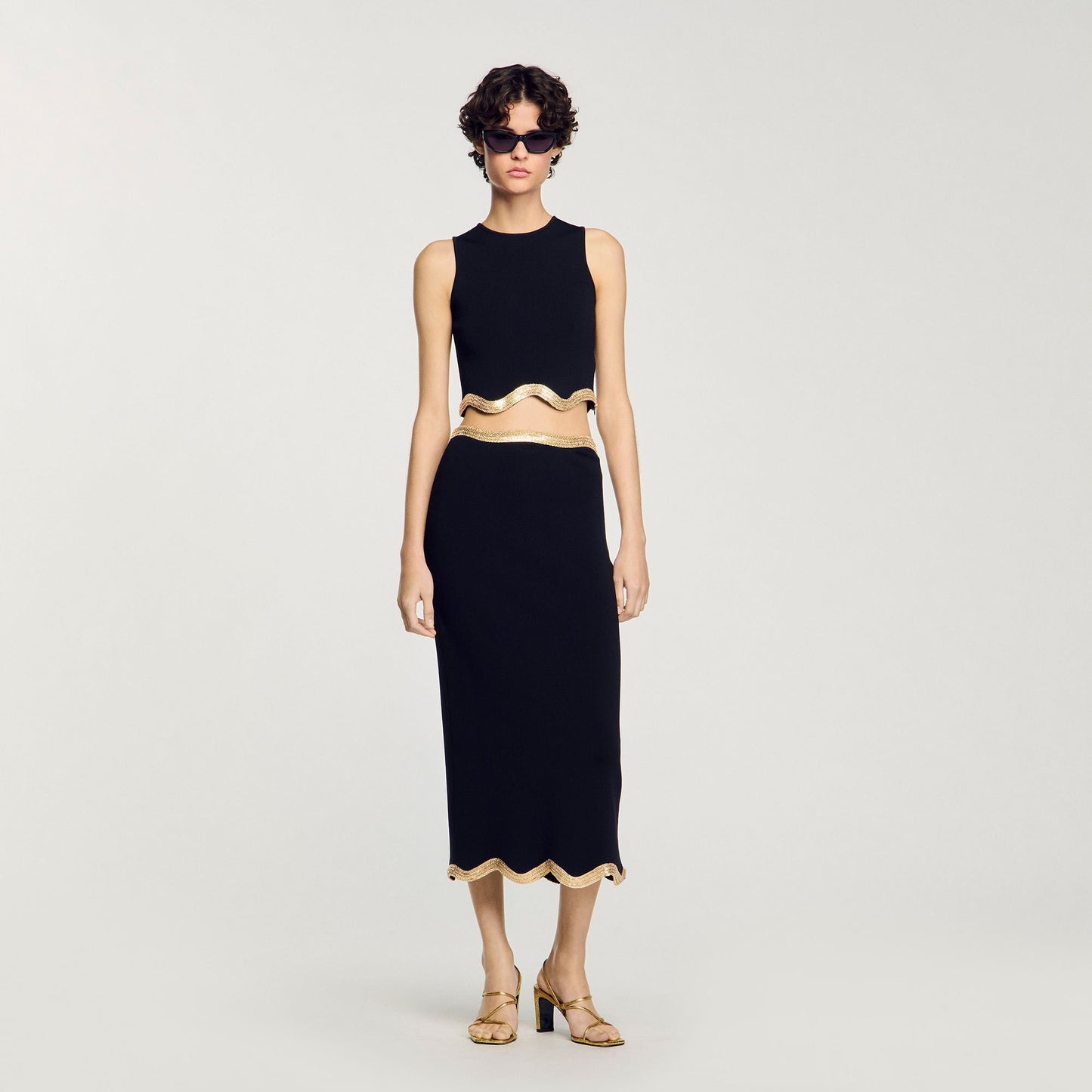 Sandro Maxi knitted skirt with chain detail Black