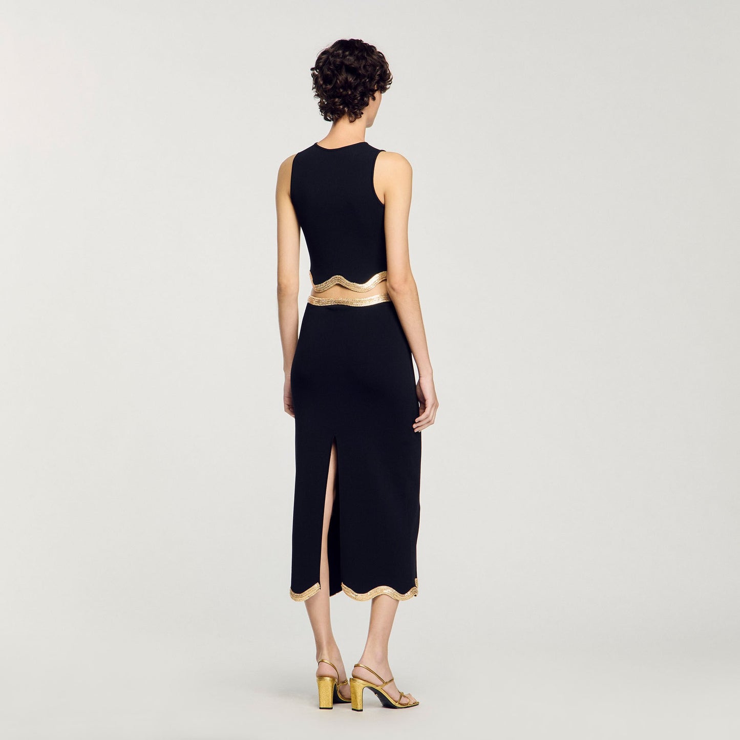 Sandro Maxi knitted skirt with chain detail Black