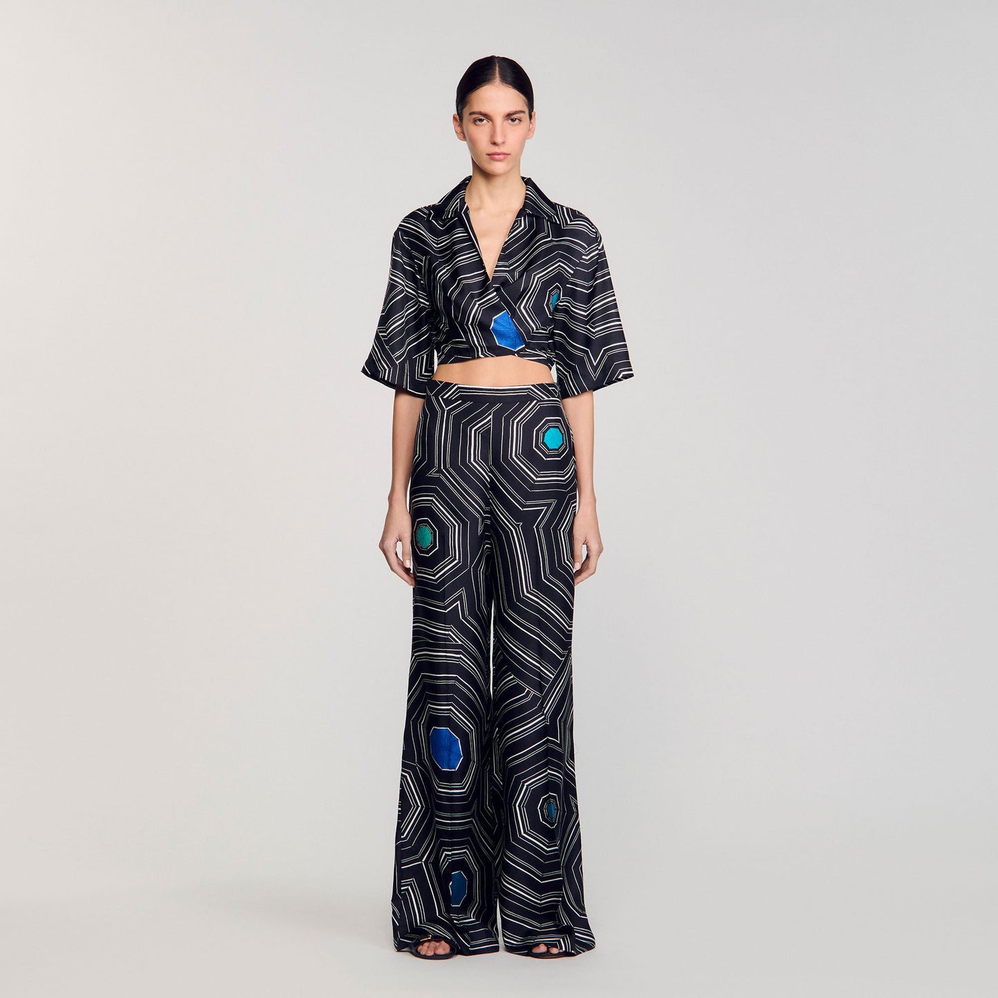 Sandro Spiral-print silk trousers Black