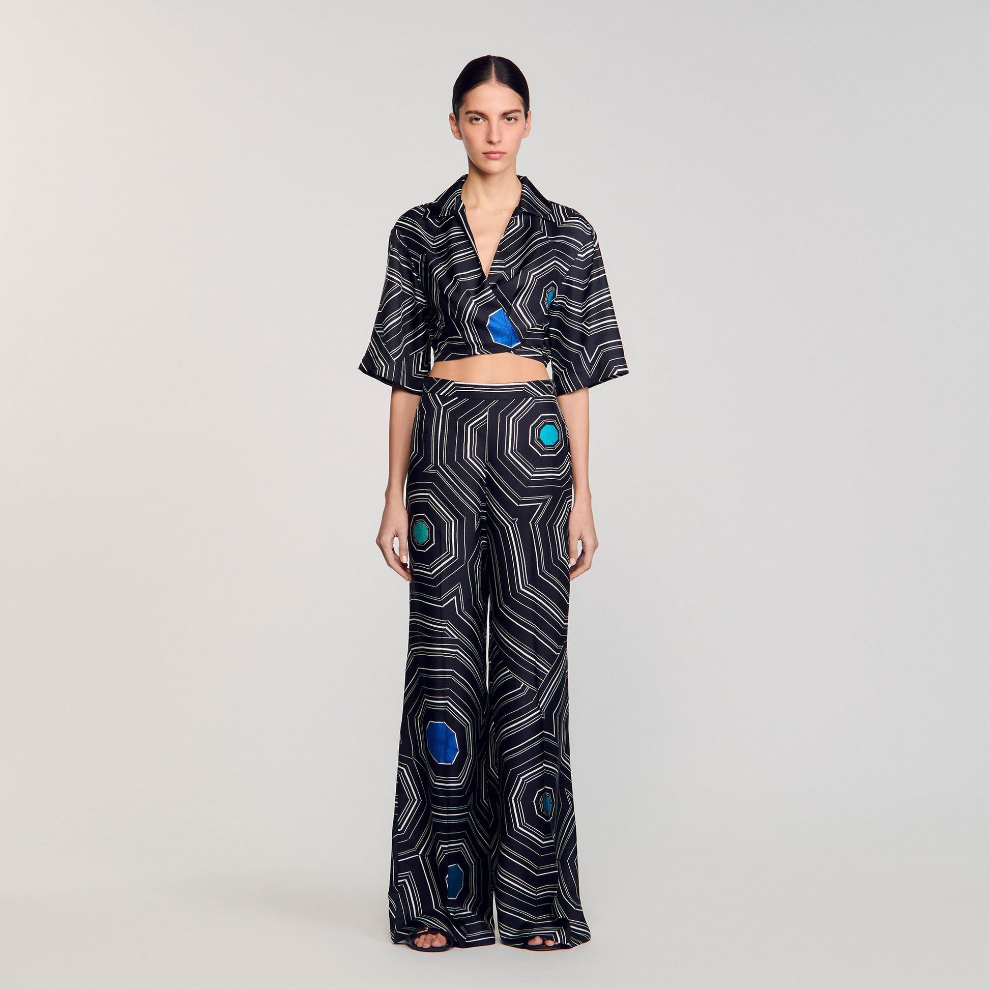 Sandro Spiral-print silk trousers Black