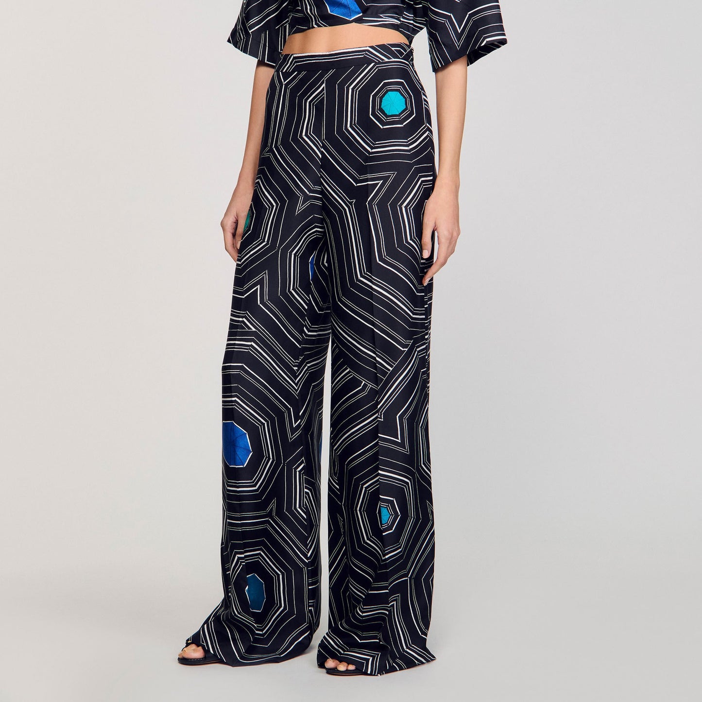 Sandro Spiral-print silk trousers Black