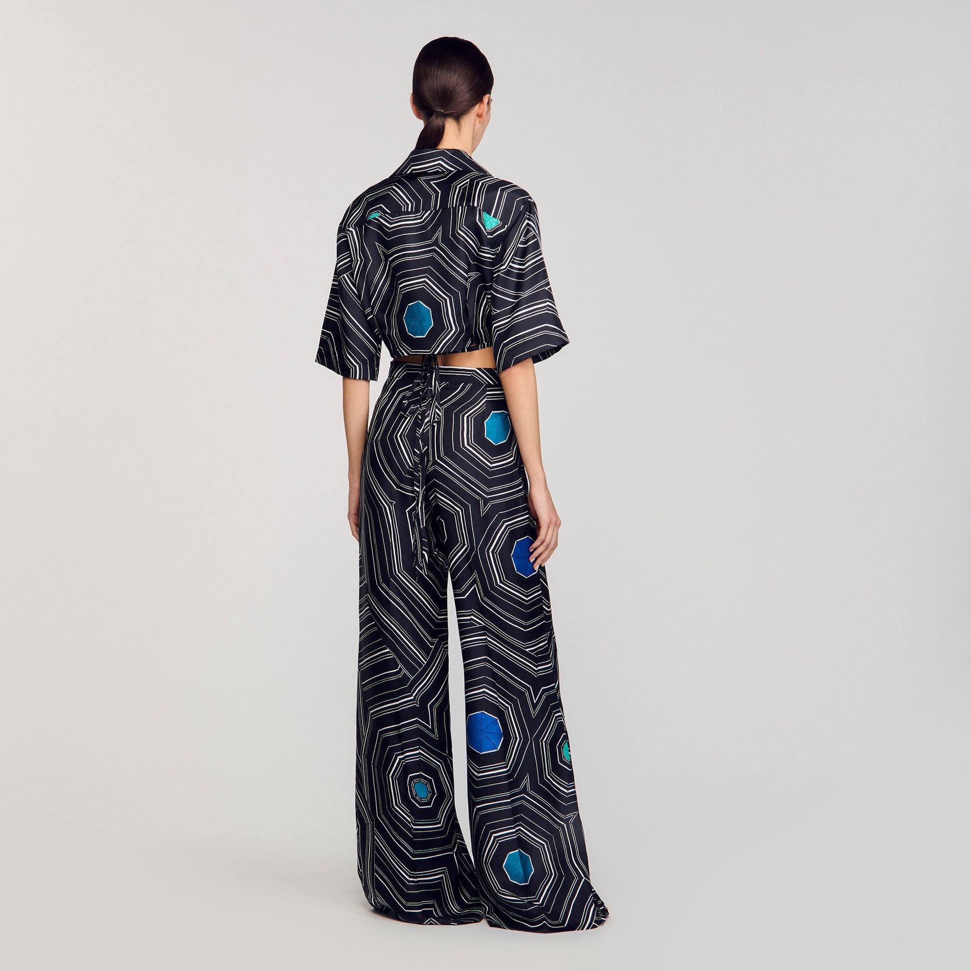Sandro Spiral-print silk trousers Black
