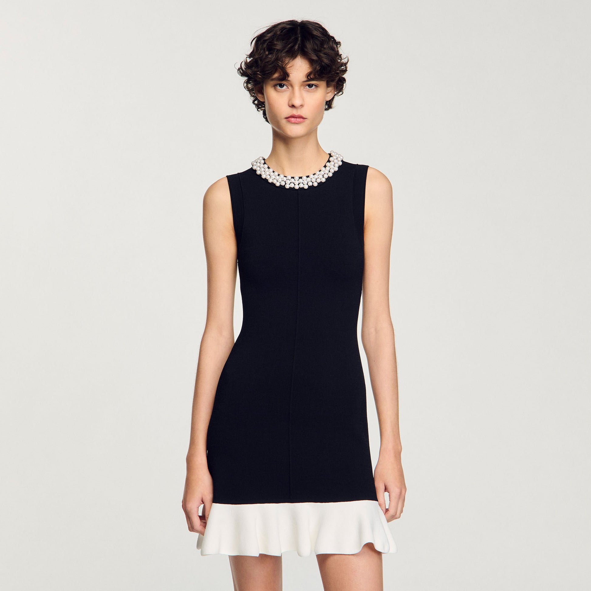 Sandro Mini knit dress with beaded neck Black / Ecru