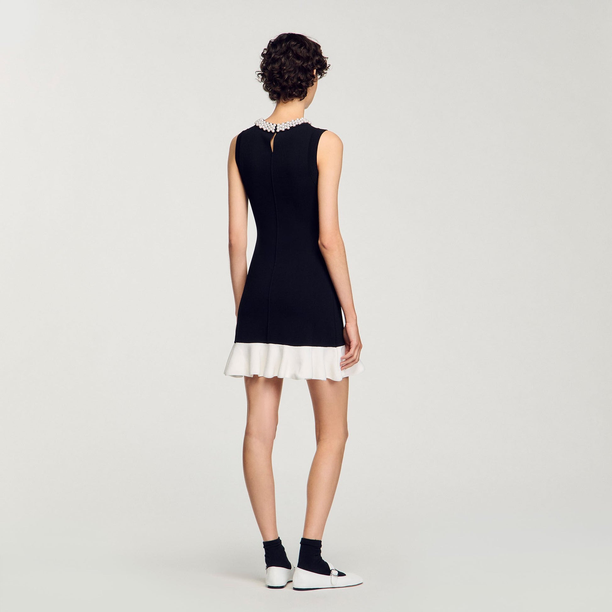 Sandro Mini knit dress with beaded neck Black / Ecru