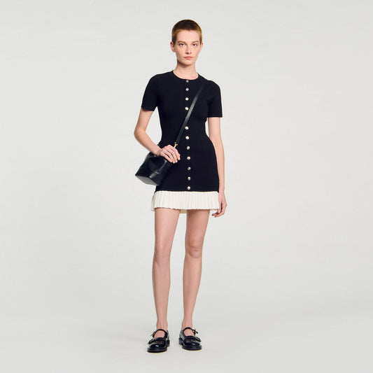 Sandro Mini knit dress with ruffle Black / Ecru