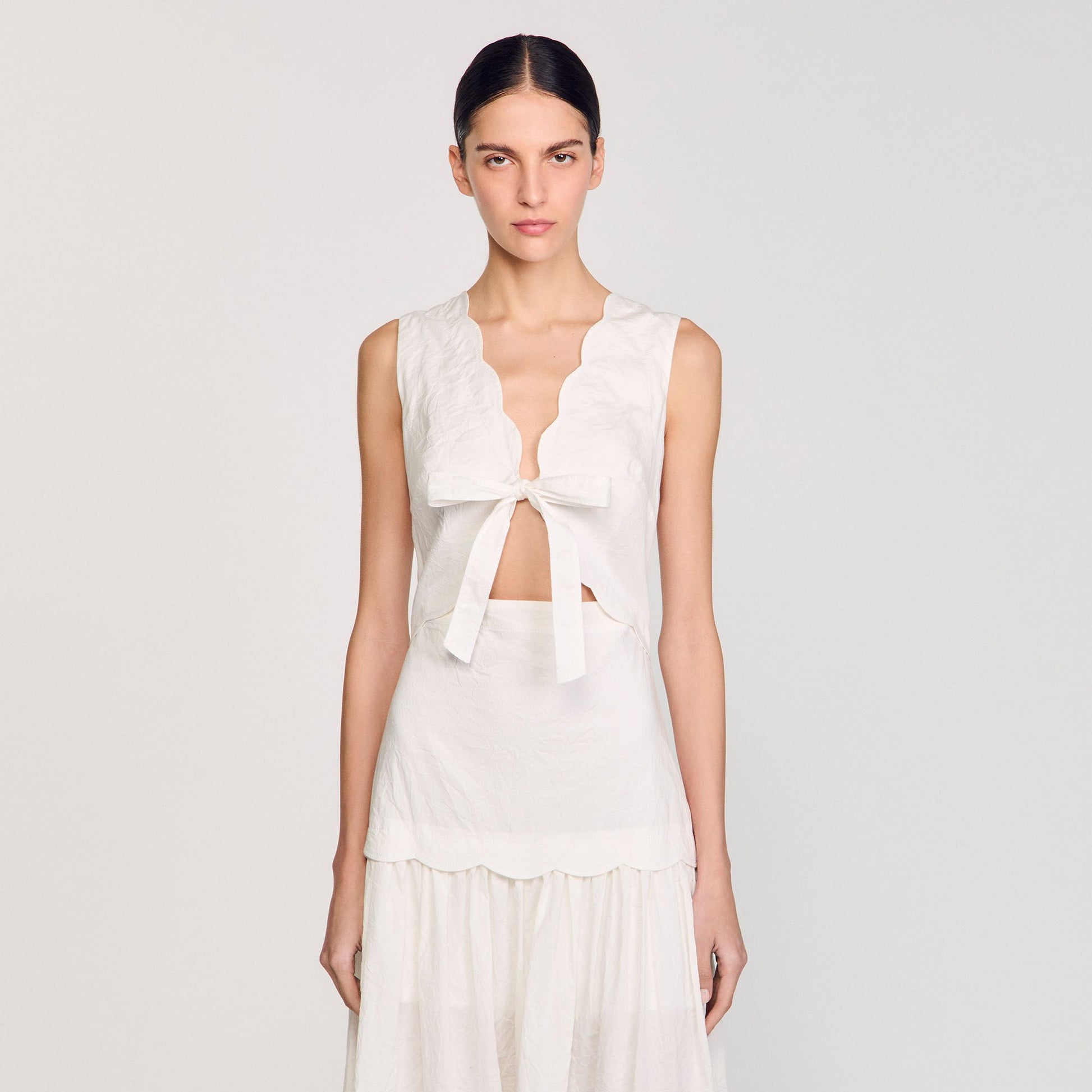 Sandro Crinkled maxi dress with bow Ecru