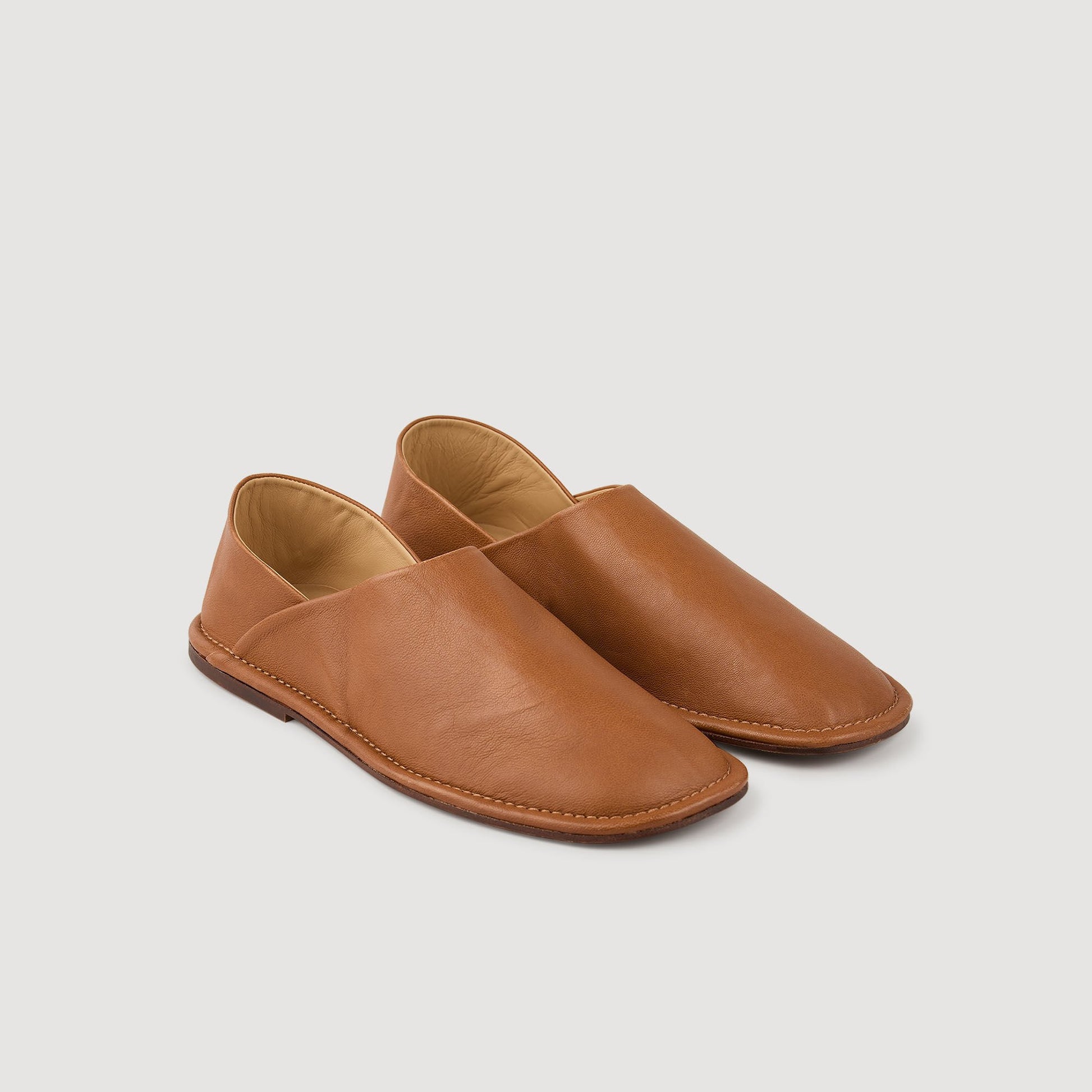 Sandro Grained leather slippers Camel