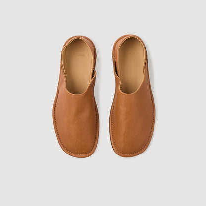 Sandro Grained leather slippers Camel
