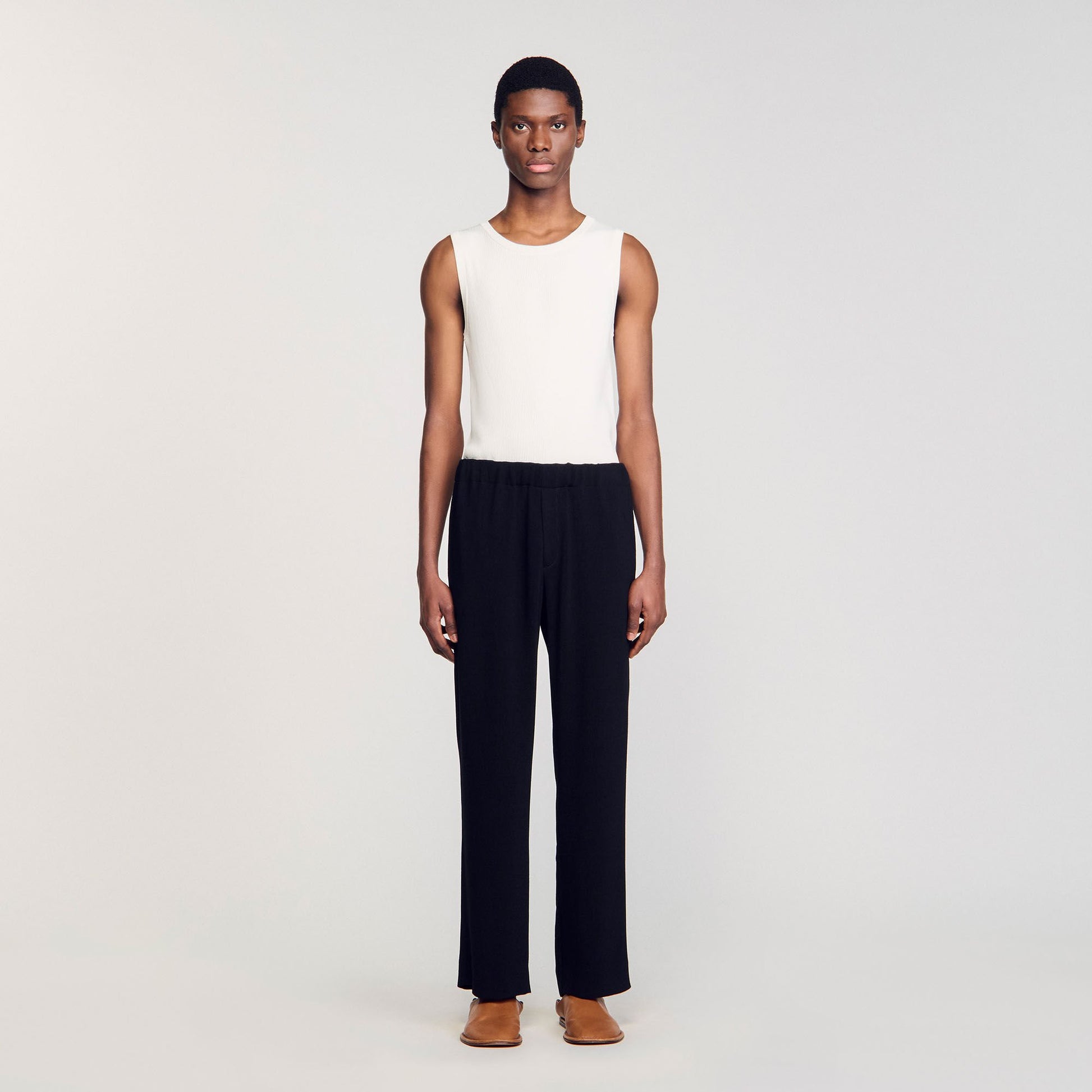 Sandro Pleated trousers Black