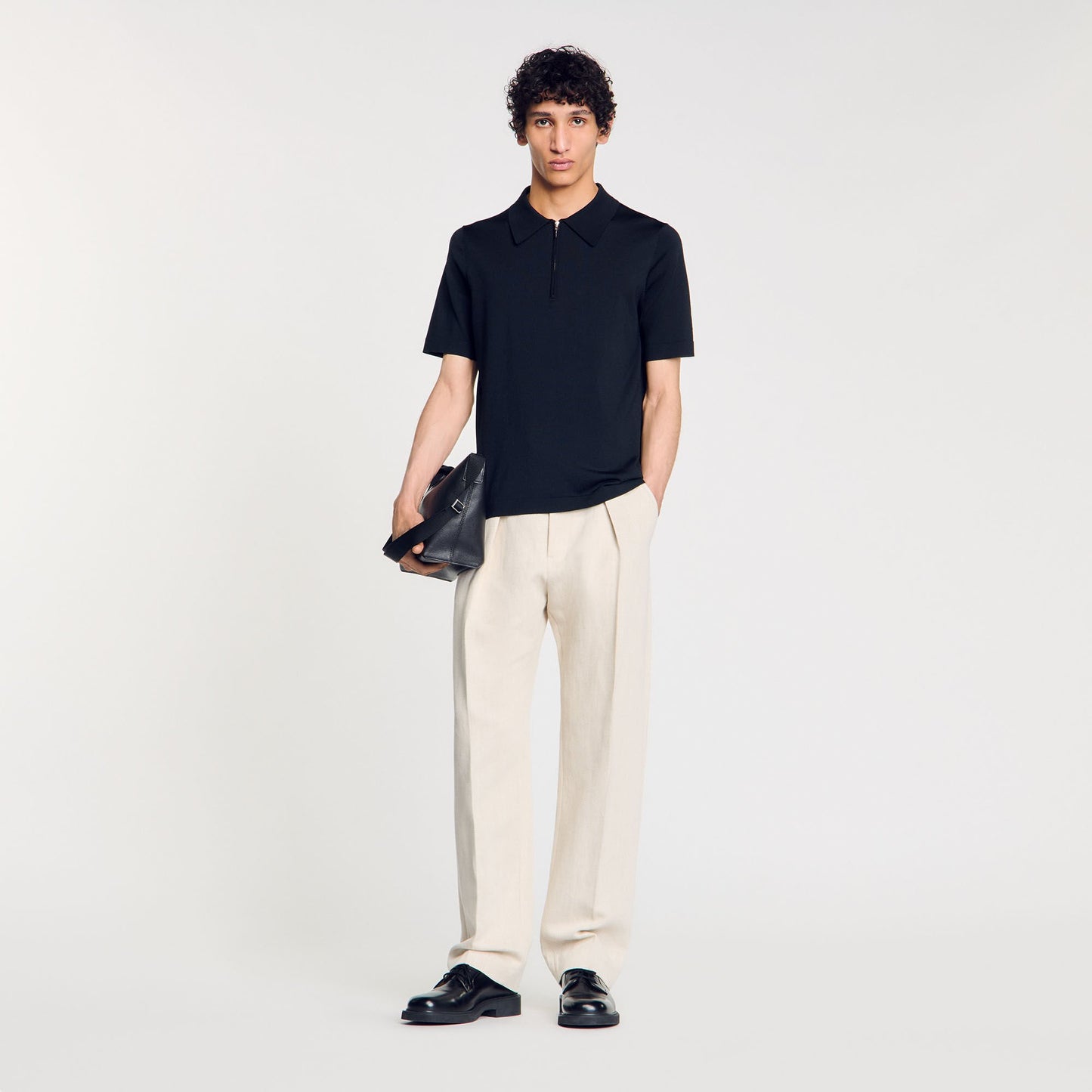 Sandro Knitted polo shirt with zip collar Fonte