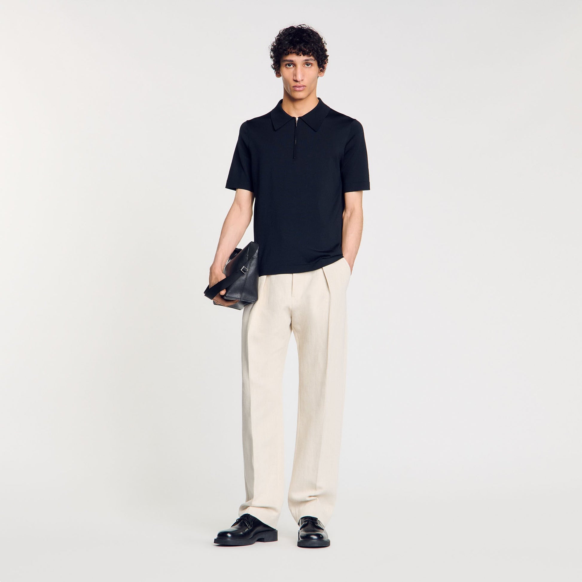 Sandro Knitted polo shirt with zip collar Fonte
