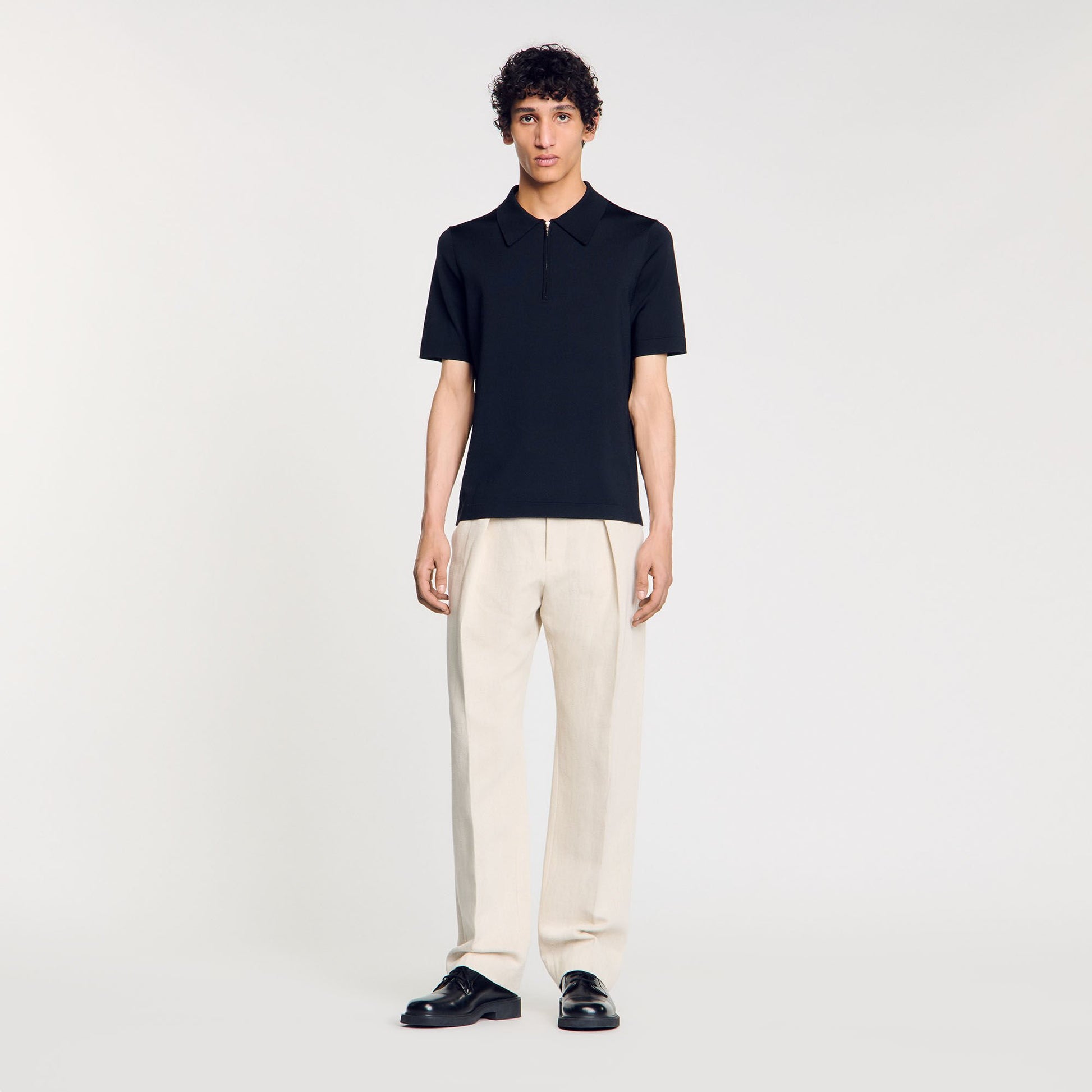 Sandro Knitted polo shirt with zip collar Fonte