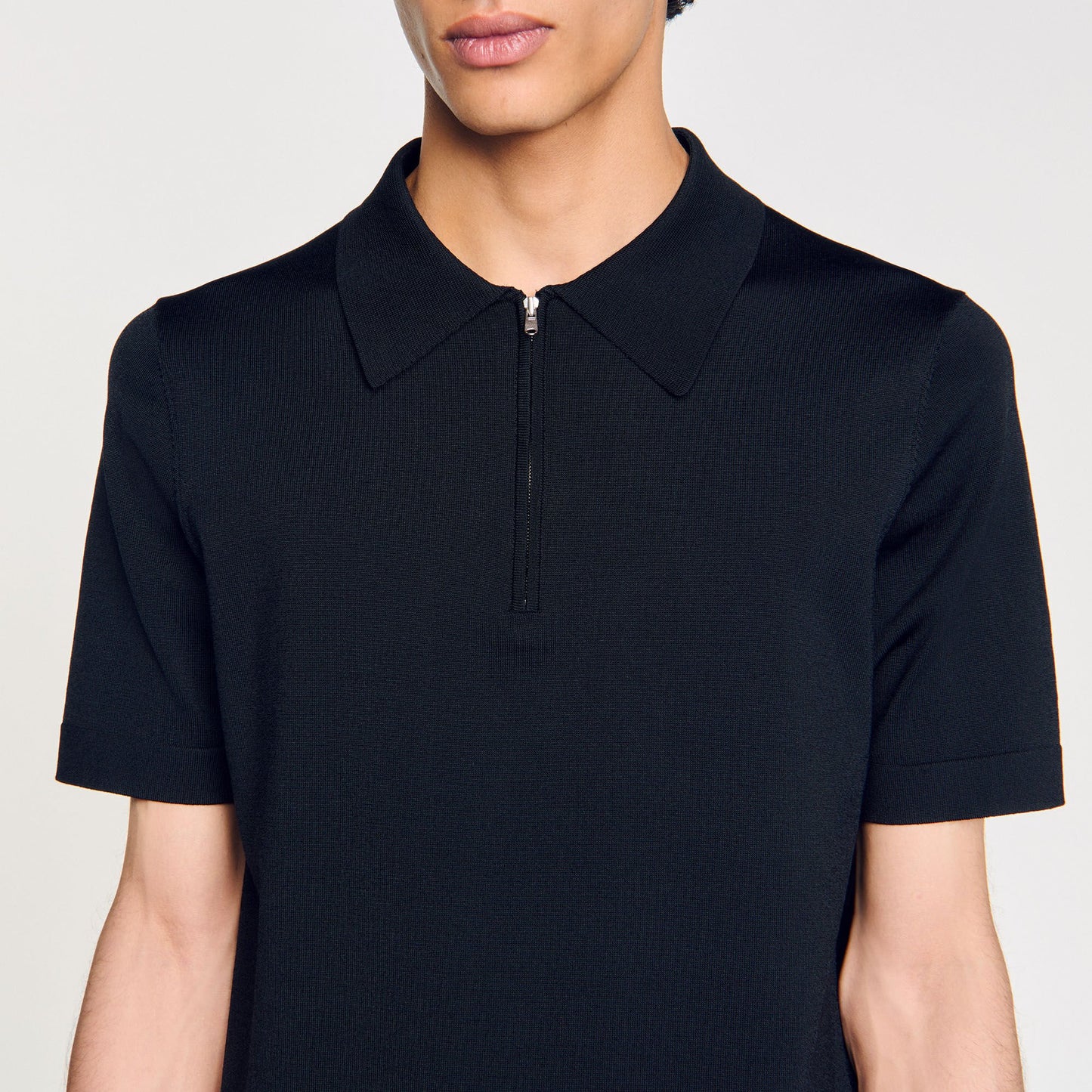 Sandro Knitted polo shirt with zip collar Fonte